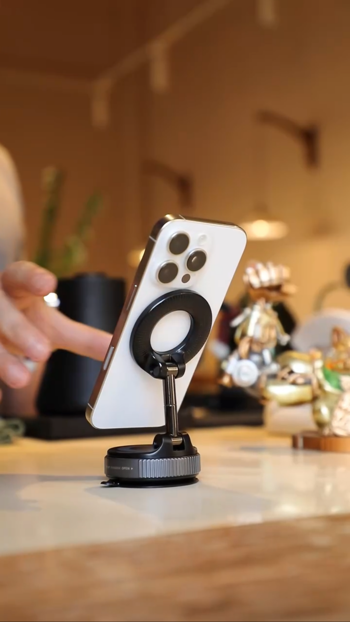 Load video: Lock it onto a smooth surface, snap in your phone, and set the perfect angle—in seconds.